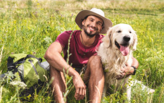 Man out hiking with his dog